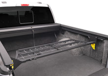 Load image into Gallery viewer, Roll-N-Lock 21-22 Ford F-150 (67.1in. Bed Length) Cargo Manager