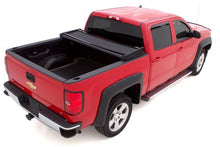 Load image into Gallery viewer, Lund 07-17 Toyota Tundra (5.5ft. Bed) Genesis Elite Tri-Fold Tonneau Cover - Black