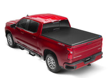 Load image into Gallery viewer, Lund 05-17 Nissan Frontier Styleside (5ft. Bed) Hard Fold Tonneau Cover - Black