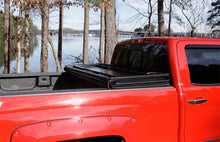 Load image into Gallery viewer, Lund 05-15 Toyota Tacoma Fleetside (6ft. Bed) Hard Fold Tonneau Cover - Black
