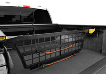 Load image into Gallery viewer, Roll-N-Lock 21-22 Ford F-150 (67.1in. Bed Length) Cargo Manager