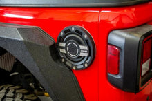 Load image into Gallery viewer, DV8 Offroad 2018+ Jeep JL Aluminum Fuel Door for 20-Pres Wrangler - D-JL-190004-MIL