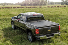 Load image into Gallery viewer, Roll-N-Lock 2009 Dodge Ram 1500 SB 76in M-Series Retractable Tonneau Cover