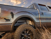 Load image into Gallery viewer, Husky Liners 2019+ Chevrolet Silverado 1500 Black Rear Wheel Well Guards