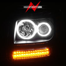 Load image into Gallery viewer, ANZO 2007-2012 Dodge Nitro Projector Headlights w/ Halo Black (CCFL) G2