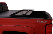 Load image into Gallery viewer, Lund 05-15 Toyota Tacoma Fleetside (6ft. Bed) Hard Fold Tonneau Cover - Black