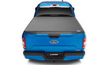 Load image into Gallery viewer, Lund 99-17 Ford F-250 Super Duty (6.5ft. Bed) Genesis Elite Tri-Fold Tonneau Cover - Black