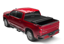 Load image into Gallery viewer, Lund 05-17 Nissan Frontier Styleside (5ft. Bed) Hard Fold Tonneau Cover - Black