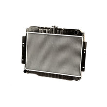 Load image into Gallery viewer, Omix Radiator 2 Row- 74-80 Jeep CJ 6/8 Cylinder