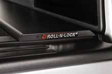 Load image into Gallery viewer, Roll-N-Lock 19-23 RAM 1500 w/o Swing Gate Tailgate SB 76.3in M-Series Retractable Tonneau Cover